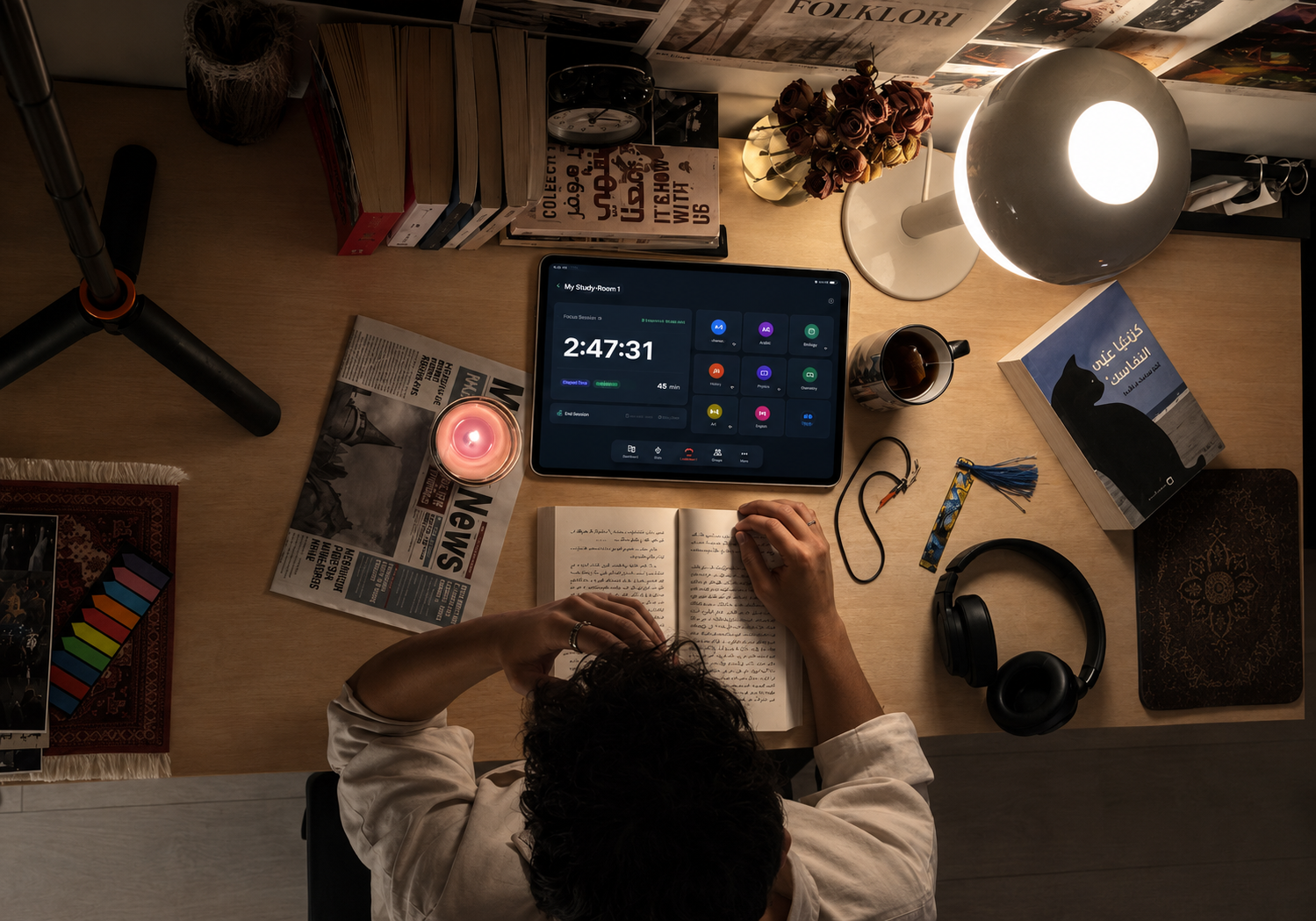 Nest study room interface shown on a tablet in a real study desk environment.